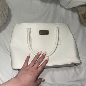 Bebe white purse never used